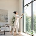 Woman cleaning a window track standing upright with the Gapzy brush